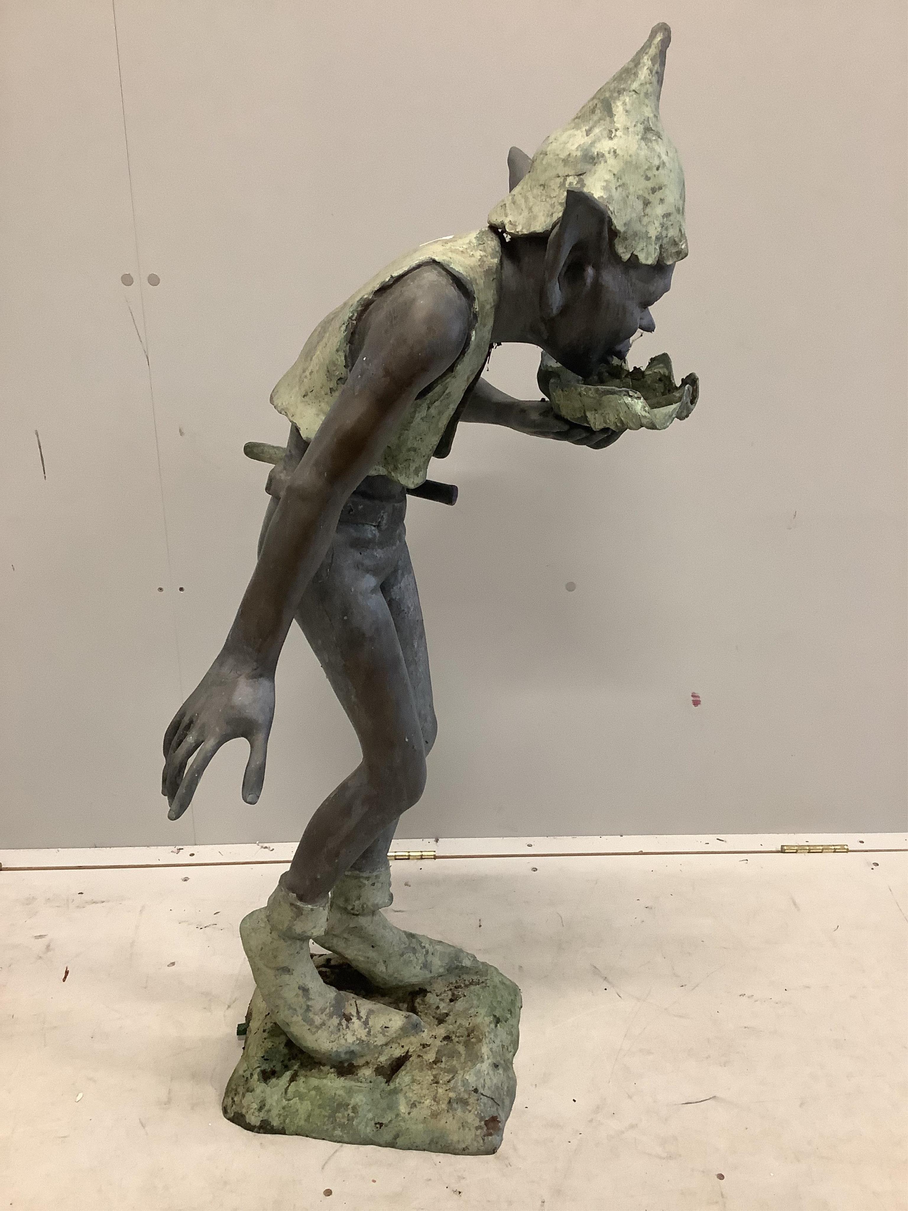 In the Manner of David Goode, a bronze garden sprite fountain, height 116cm. Condition - fair